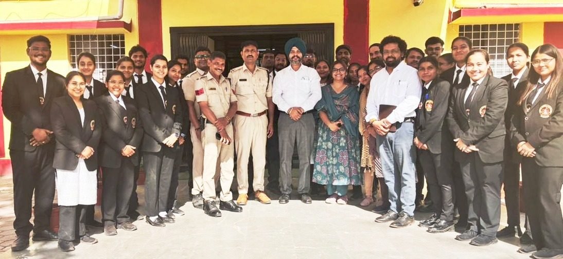 Group photograph with police personnel at a college event