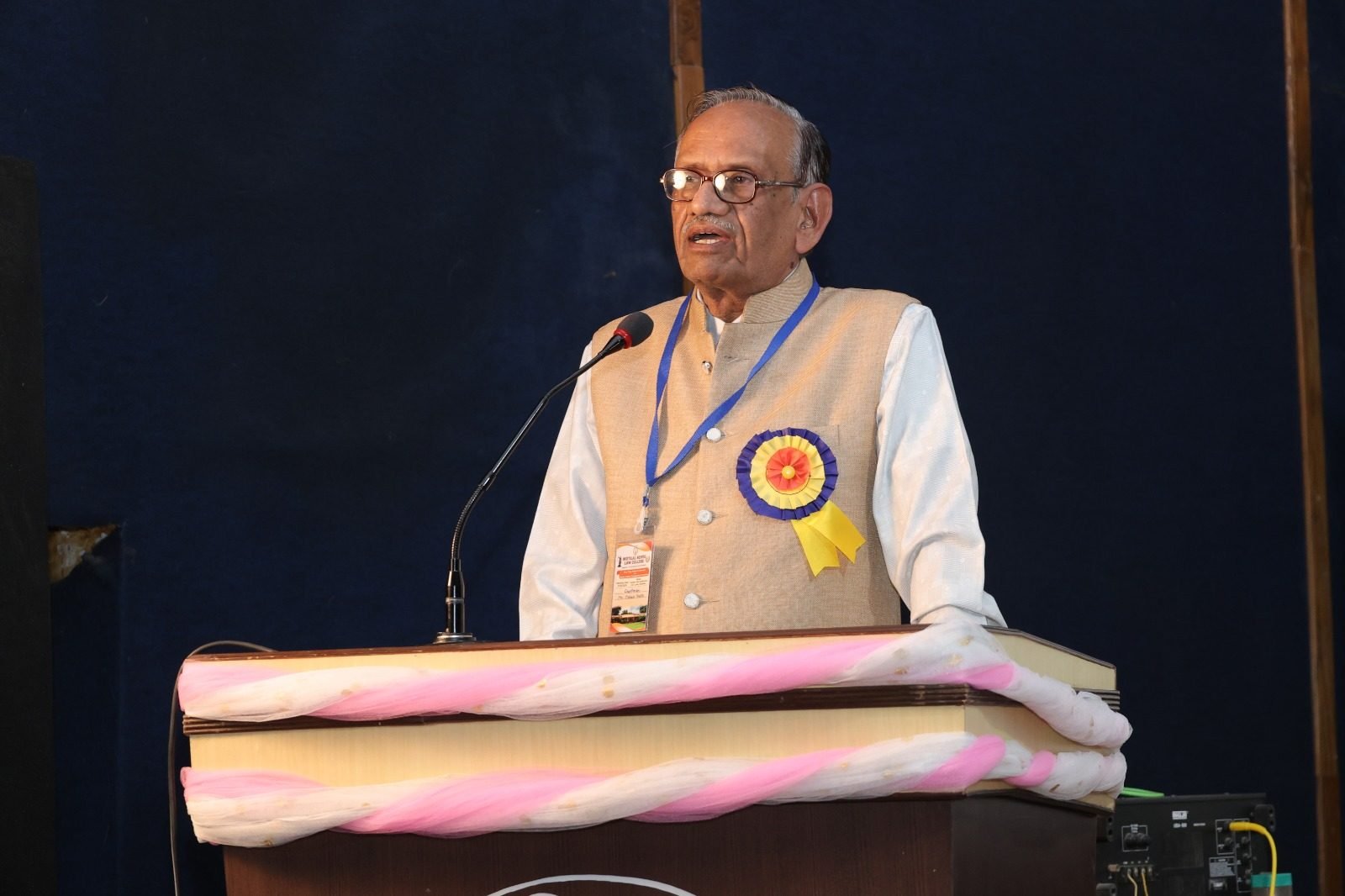 Speaker addressing attendees at a college seminar