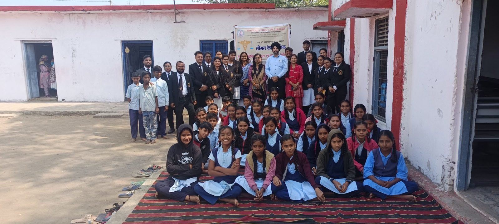 Group photograph of students and staff outside the college